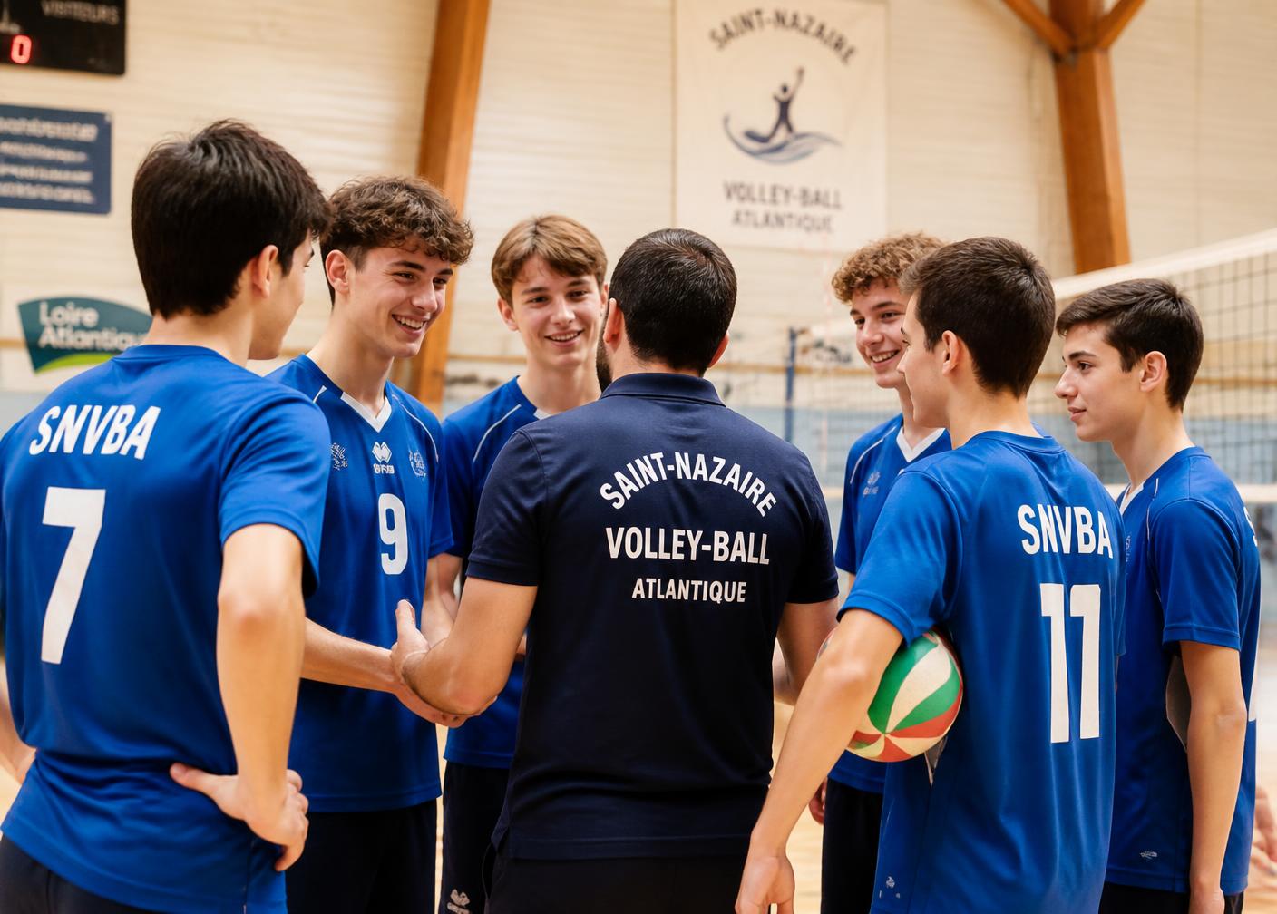 Jeunes joueurs avec leur entraîneur